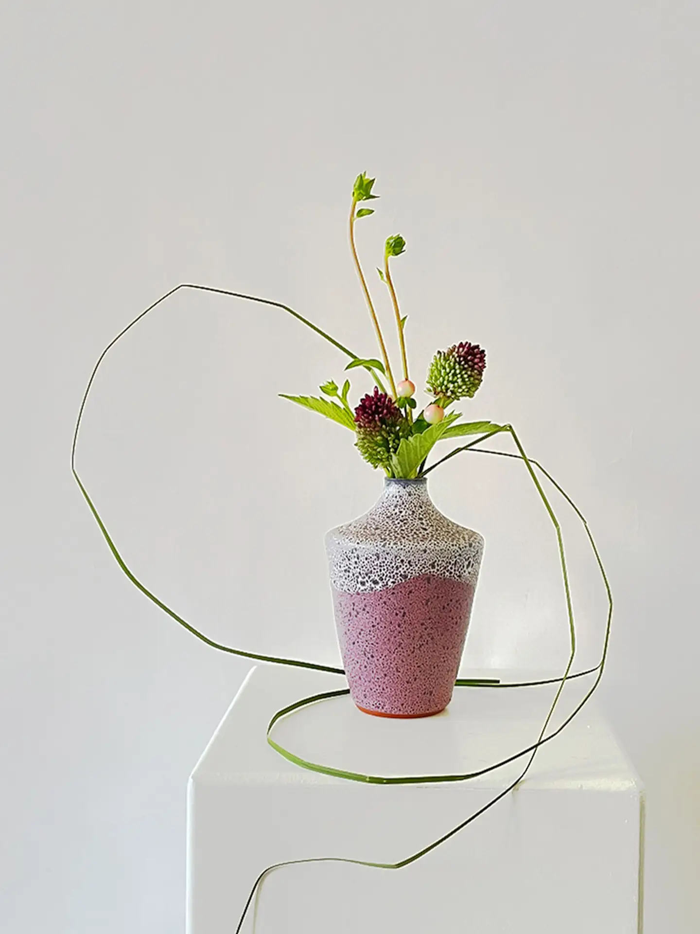 Minimal flower arrangement with sanguisorba and greenery in a vintage ceramic vase by Siegfried Gramann for Römhild, created by suminumi in Berlin.